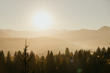 sunset in the Carpathians, autumn landscapes of the Carpathians, sunset in the mountains, mountain horizons, autumn warm sunset on the top of the mountain, mountains in autumn