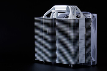 High-performance metal CPU cooler heatsink with heat pipes and fan on a tower radiator, perfect for tech product listings, hardware showcases, and e-commerce catalogs. Photo