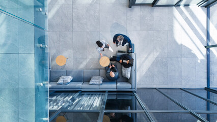 Business people, above and strategy in office with collaboration, financial pitch with document for meeting. Top view, tax accountant and table teamwork with budget paper for economy in building