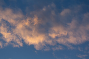 Pink clouds in the sky at sunset