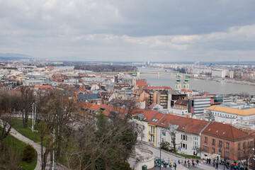 A panoramic view of the city of Budapest in Hungary over the river Danube as seen from Buda Castle.
