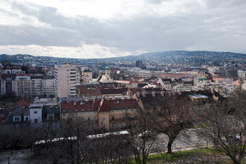 A panoramic view of the city of Budapest in Hungary over the river Danube as seen from Buda Castle.