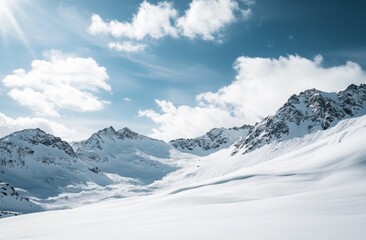 Obraz premium Snowy mountain landscape under a vibrant blue sky