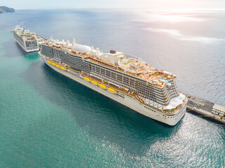 Luxurious cruise ship sailing the open sea, a dreamy escape for vacation seekers amidst calm waters...