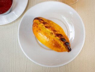 View of fresh empanada with cheese and jamon. Latin American traditional dish