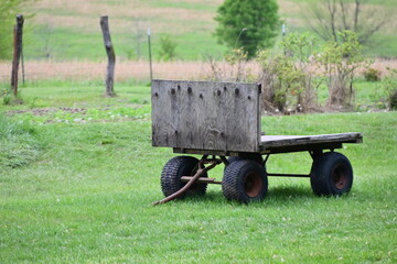 Wooden Trailer in a Field