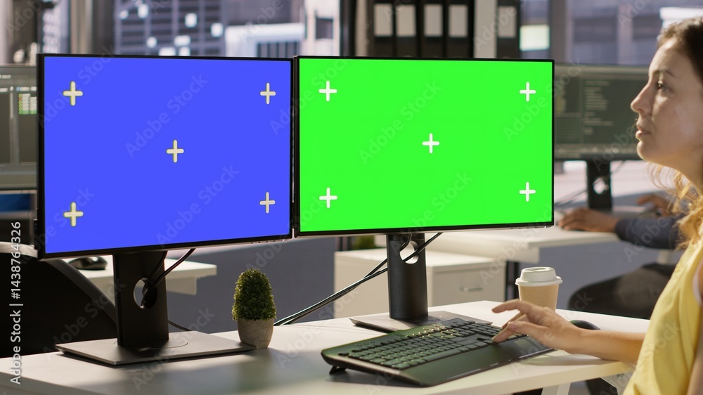 Poster employee using multi monitor isolated screen computer to analyze datasets, comparing accounting figu