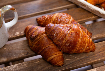 Fresh tasty croissants - pastries for a delicious breakfast