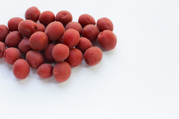 Umeboshi, Japanese pickled plums, Sour and salty taste.