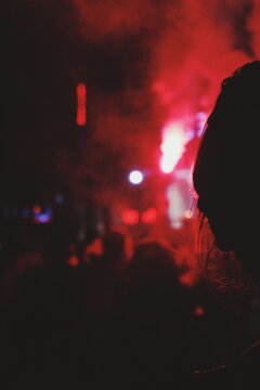 Night political protest outside red lights