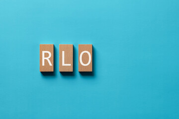 There is wood block with the word RLO. It is an abbreviation for Recovery Level Objective as...
