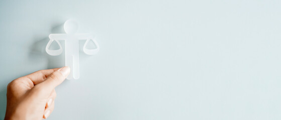 Obraz premium Hand holding Ethical model, business ethics and corporate compliance concept 