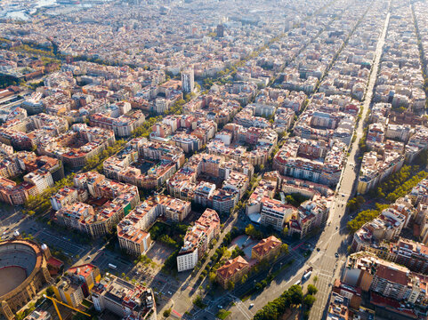 Panoramic view from drone of Eixample district in Barcelona at sunny day, Spain..