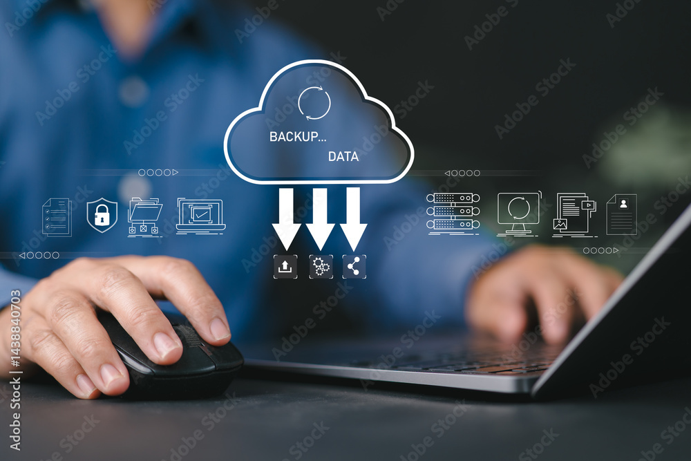 Aufkleber Businessman using a laptop to back up storage data Internet technology concept for backup online documentation database and digital file storage system or software, file access, doc sharing.