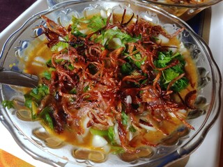 Bangladeshi traditional shahi haleem with ingredients rice flour,  various seeds flour, spices,...