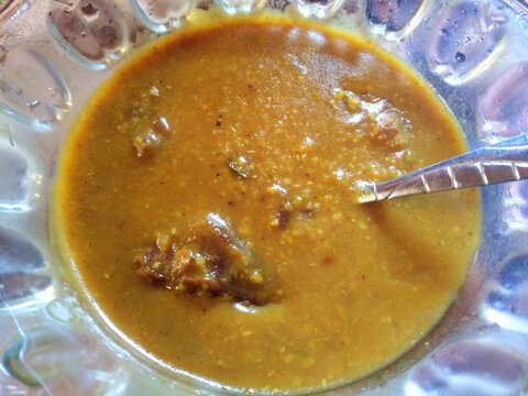 Sambar mix dal curry food. Halim Bengali traditional delicious spicy cooked food for healthy nutritional benefit. Ingredients of  rice flour, meat, salt, mix vegetables, tamarind, herbs, spices etc.
