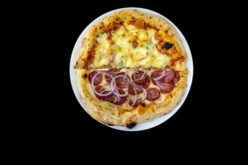 The most authentic Brazilian pizza, half pepperoni, onion and half four cheeses