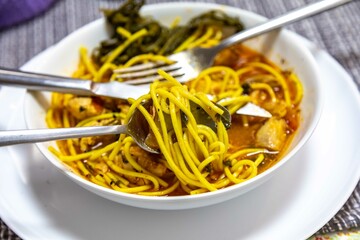 The most traditional Ukrainian soup, made with free-range chicken broth, homemade noodles and fresh parsley and chives, known as russil or rossil