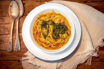 The most traditional Ukrainian soup, made with free-range chicken broth, homemade noodles and fresh parsley and chives, known as russil or rossil