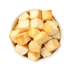 Delicious crispy croutons in bowl isolated on white, top view