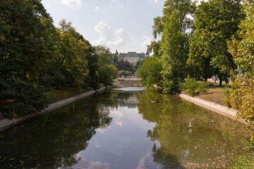 A river with a house in the background