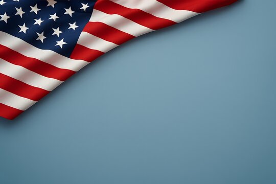 Elegant American flag on muted blue background with extensive copy space, perfect patriotic image for Memorial Day announcements, Fourth of July promotions, and veteran tributes.