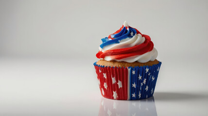 Patriotic cupcake delight on a reflective surface