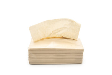 Brown tissue paper pack isolated on white background. Clipping path and copy space.