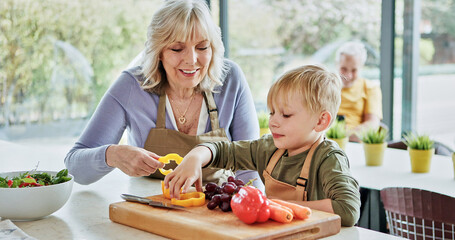 Teaching, grandmother or child cooking for lunch, vegetables or nutrition with love in family home. Fruits, grandparents or happy kid with elderly grandma, smile or food for health, care or wellness