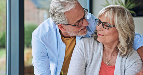 Love, hugging and senior couple at their home for happiness, bonding and romance together in morning. Smile, care and elderly man embracing his wife from Australia at modern house on a weekend.