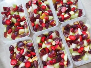 Refreshing fruit salads served in plastic container