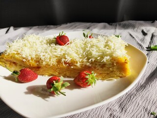 Steamed brownies with cheese and strawberry on top