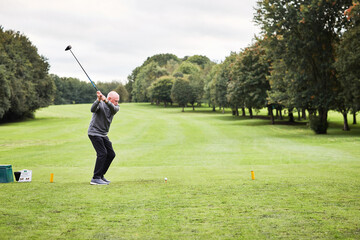 Golf, fitness and game with old man, player and competition with hobby and sunshine with activity....