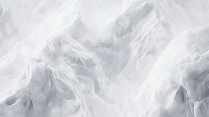 Obraz premium Aerial View of Snowy Mountain Peaks Winter Landscape