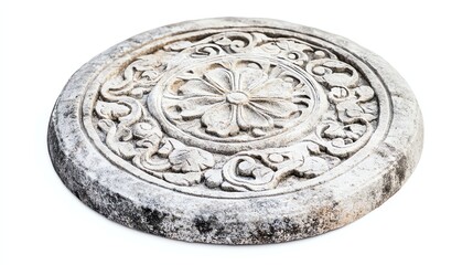 Fototapeta premium Ornate stone disc with intricate floral carvings, white isolated background.