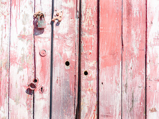 Street and buildings of Mangaweka Old faded doors of shed on street