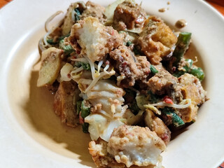 Rujak cingur is a traditional food typical of East Java, especially Surabaya, which is made from various fresh ingredients such as cingur meat (cow skin), vegetables and fruit sprinkled with Indonesia