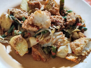 Rujak cingur is a traditional food typical of East Java, especially Surabaya, which is made from various fresh ingredients such as cingur meat (cow skin), vegetables and fruit sprinkled with Indonesia