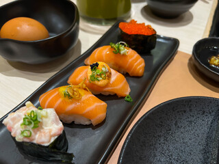 Sushi Roll with salmon, eel, tuna, avocado, royal prawn, cream cheese Philadelphia, caviar tobica, chuka. Sushi menu. Japanese food.	
