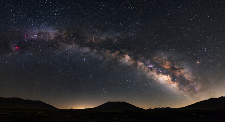 Fototapeta premium Milky Way Over Dark Mountain Range Stunning Night Sky Landscape