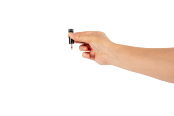Hand and black audio cable aux isolated on transparent background