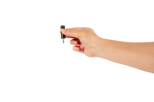 Hand and black audio cable aux isolated on transparent background