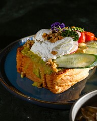 Gourmet poached egg toast with fresh vegetables cozy kitchen culinary photography intimate setting close-up view artful presentation