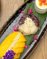 Delicious mango sticky rice dessert asian cuisine culinary delight vibrant setting close-up sweet treat inspiration