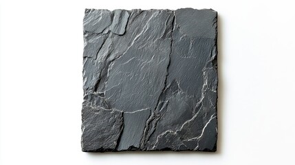 A square slate tile with rough edges and a textured surface on a plain white background in a studio shot