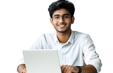  An attractive Indian man smiling and using a laptop on a white table, transparent background PNG, PNG file with cutout elements