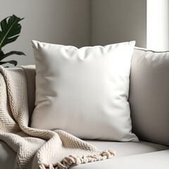 Plain pillow mockup on a cozy couch with a throw blanket
