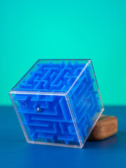 Close-up of a volumetric blue  cube maze on a blue background