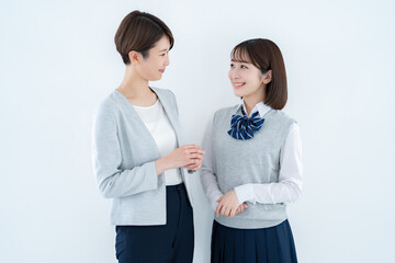先生と話す学生