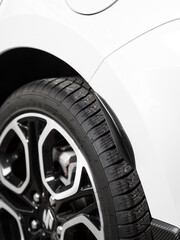 Tuning close-up, black decorative trim on the bumper of a sports car